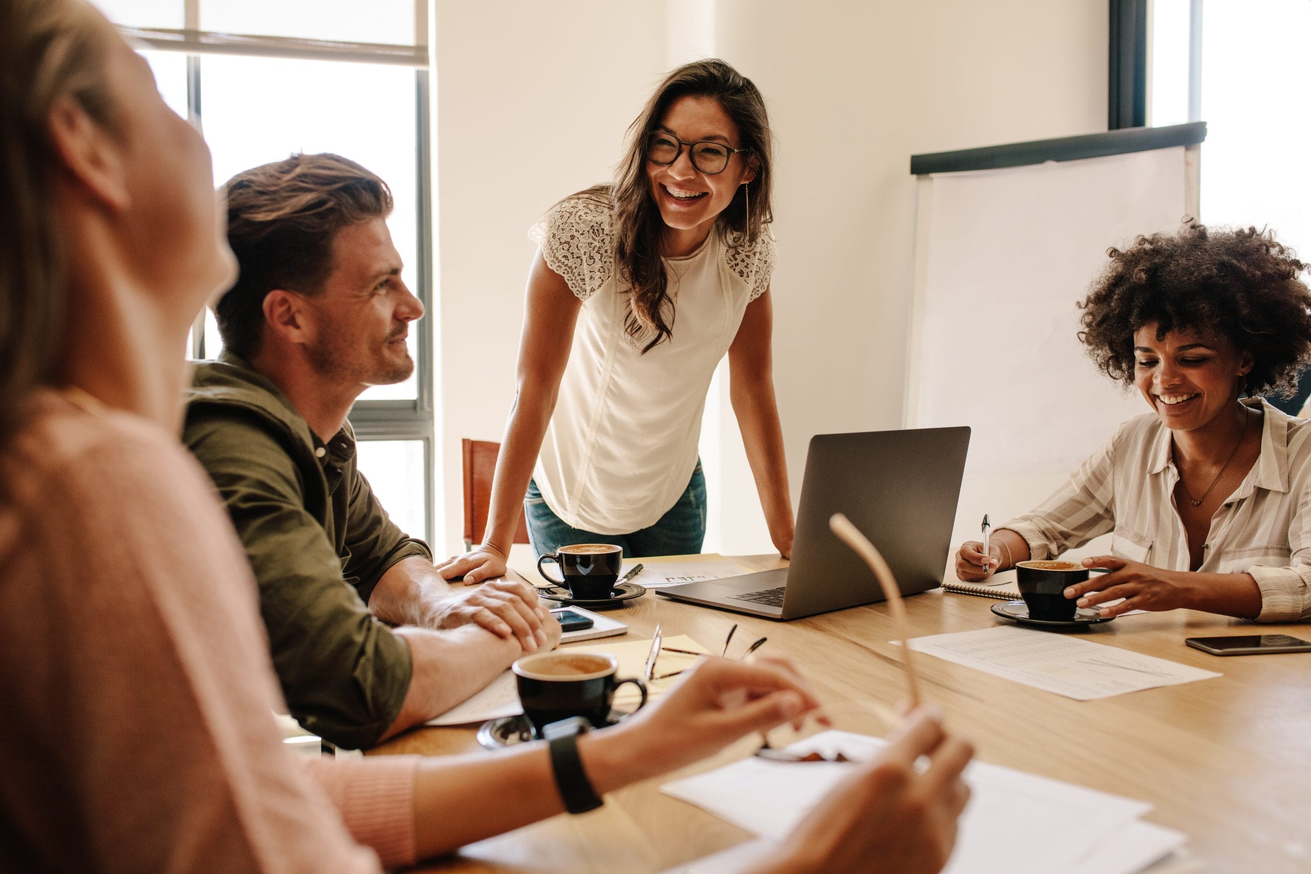 A leader overseeing a collaborative group